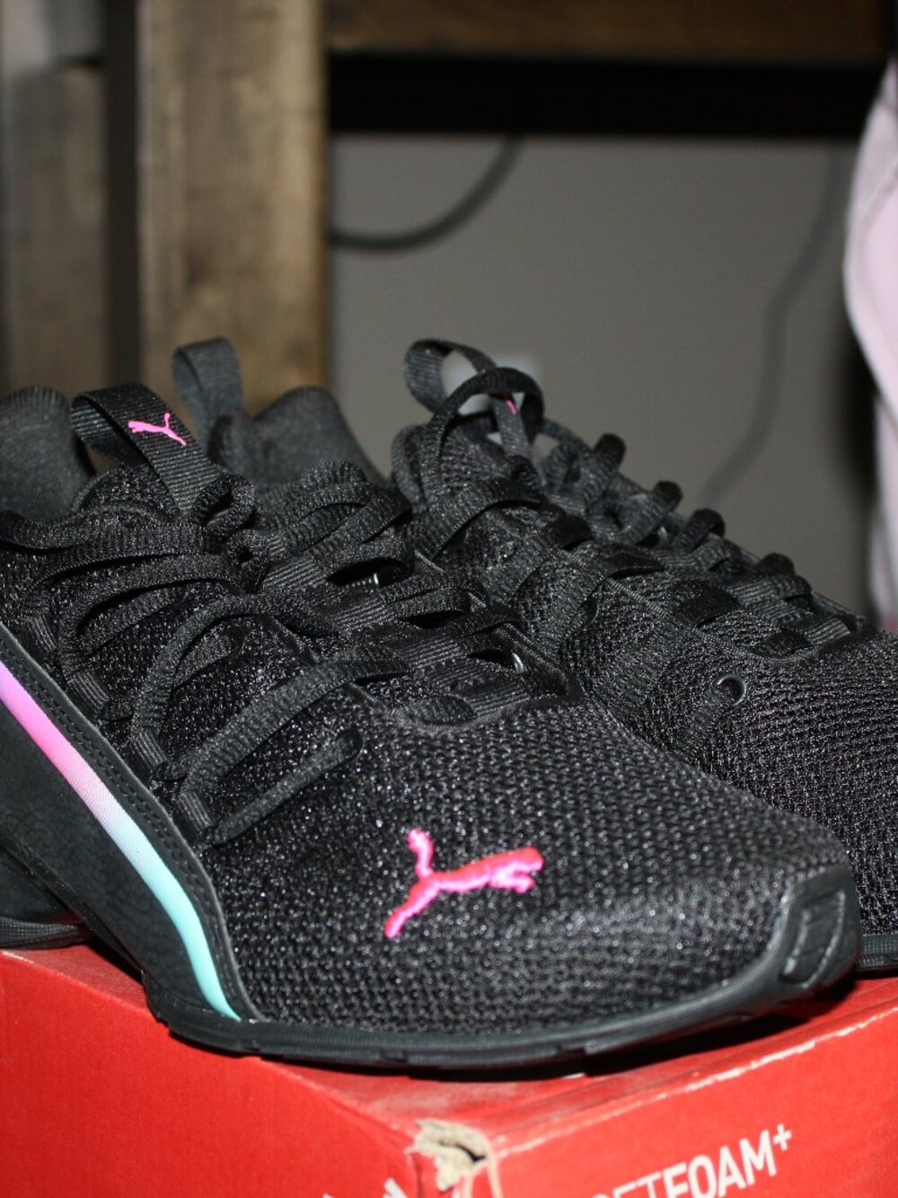Puma, Black Tennis shoe with multi color emblem. Women's size 7.5 NIB